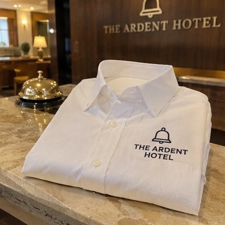Custom hotel dress shirt on a front desk